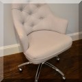 F31. Tufted desk chair. 